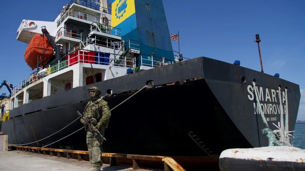A Russian serviceman stands guard in the port of Mariupol on 29 April 2022, amid the ongoing Russian military action in Ukraine. (AFP)