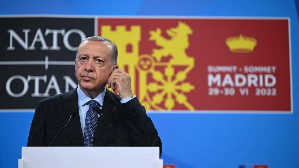 Turkey's President Recep Tayyip Erdogan addresses media representatives during a press conference at the NATO summit at the Ifema congress centre in Madrid, on June 30, 2022. (AFP)