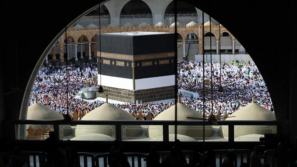 Muslim worshippers around the Kaaba at the Grand Mosque in Saudi Arabia's holy city of Mecca on 5 July 2022. (AFP)