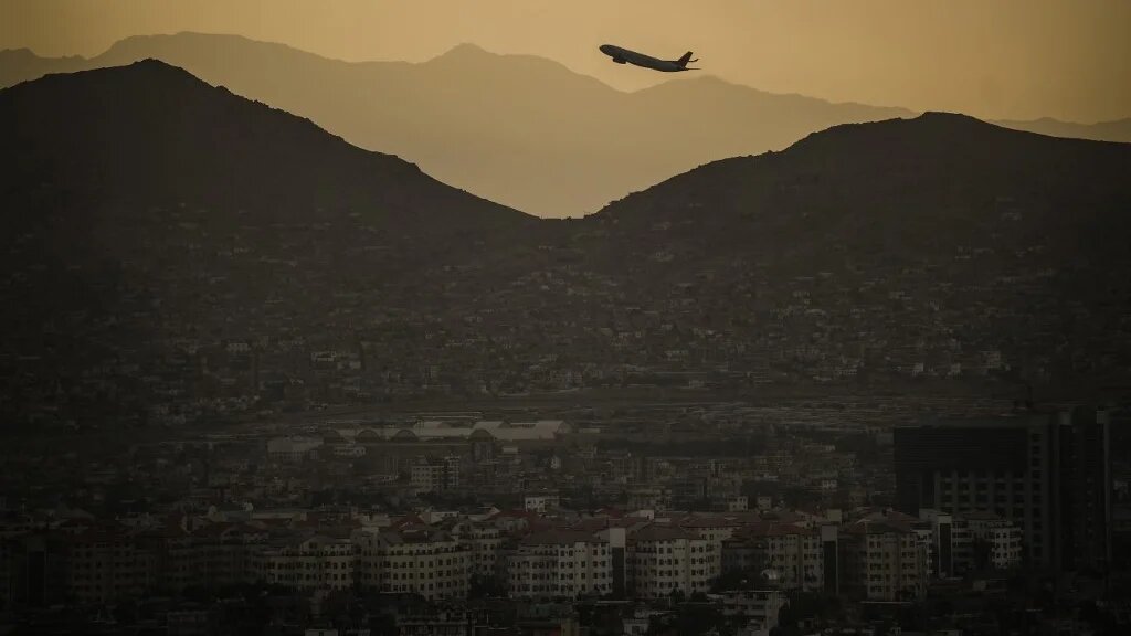 A plane takes off Hamid Karzai International airport in Kabul, Afghanistan on August 4, 2022. (AFP)