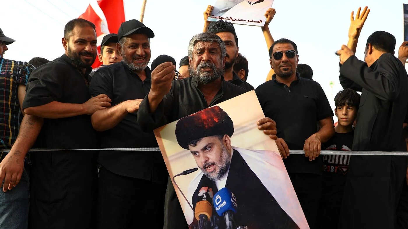 Supporters of Muqtada Sadr in the city of Nasiriyah on 14 August (AFP)