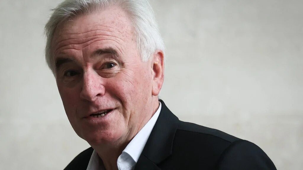 John McDonnell arrives at the BBC in central London on 16 October 2022 (AFP)
