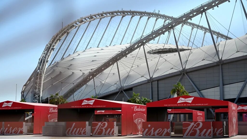 Budweiser beer kiosks are pictured at the Khalifa International Stadium in Doha on 18 November 2022 ahead of the Qatar 2022 World Cup football tournament (AFP)