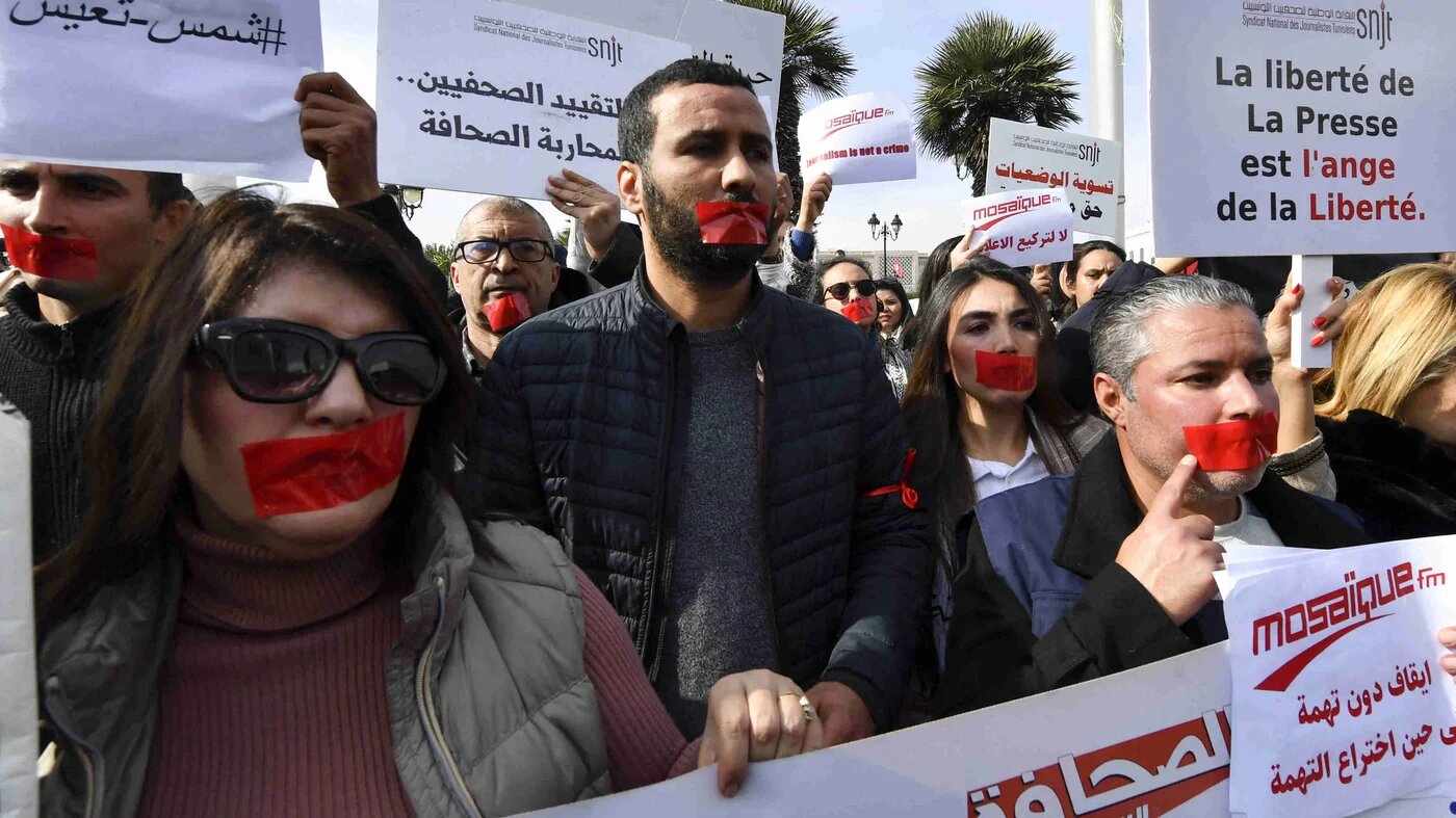 Tunisian journalists protest in defence of freedom of expression and against the persecution of journalists in Tunis on 16 February 2023 (AFP)