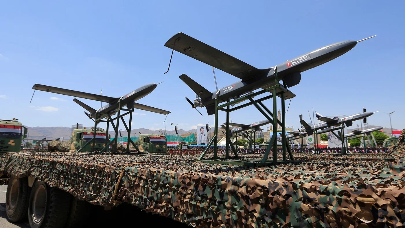 Drones are displayed on the back of a vehicle during an official military parade marking the ninth anniversary of the Houthi takeover of the capital Sanaa on 21 September 2023 (AFP)