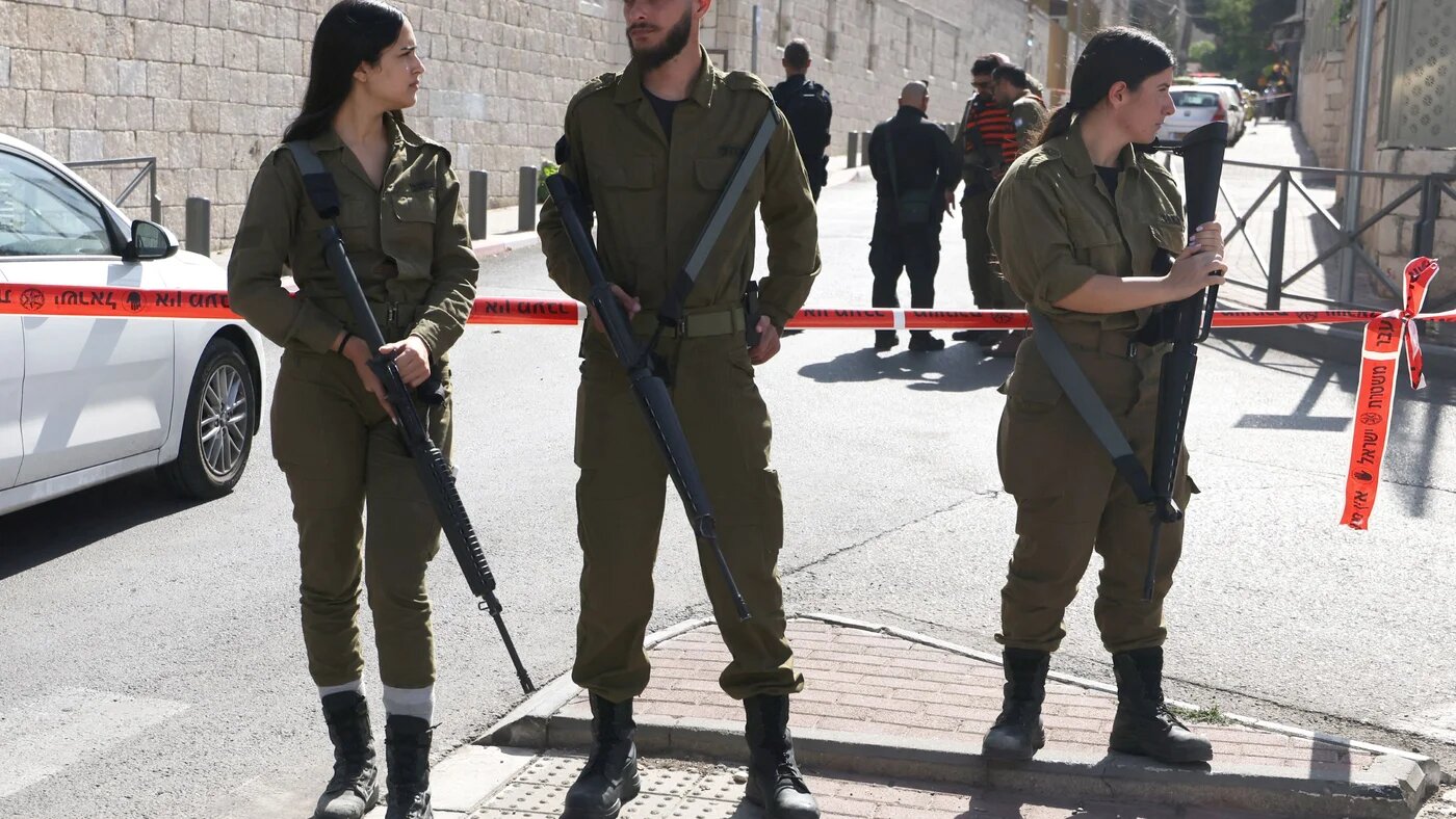 Israeli security forces deploy at the site of a reported attack in east Jerusalem on 30 October 2023 (AFP)