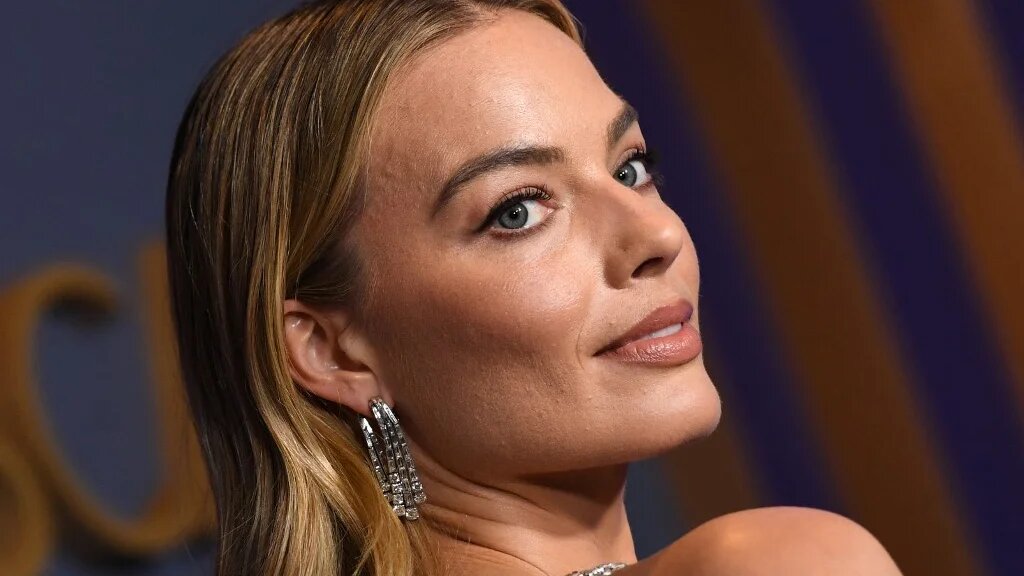 Australian actress Margot Robbie arrives for the Academy of Motion Picture Arts and Sciences' 14th Annual Governors Awards in Los Angeles on January 9, 2024 (Valerie Macron/AFP)