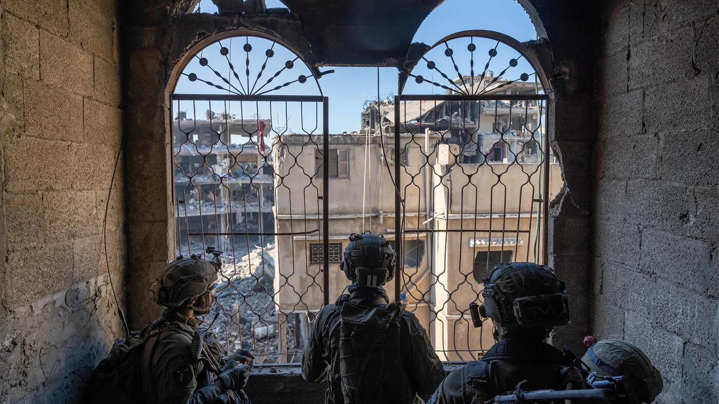 Soldats israéliens dans la bande de Gaza, le 14 février 2024 (AFP)