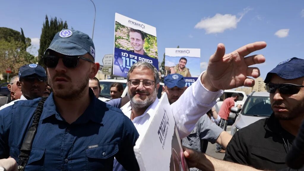 National Security Minister Itamar Ben Gvir greets supporters near the prime minister's office in Jerusalem on 5 May (Menahem Kahana/AFP)