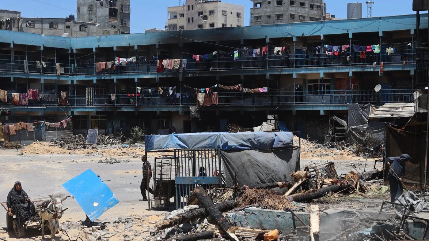 Blackened walls of a school housing internally displaced Palestinians in the Jabalia refugee camp following an Israeli raid in the Gaza Strip on 1 June 2024 (AFP/Omar al-Qattaa)