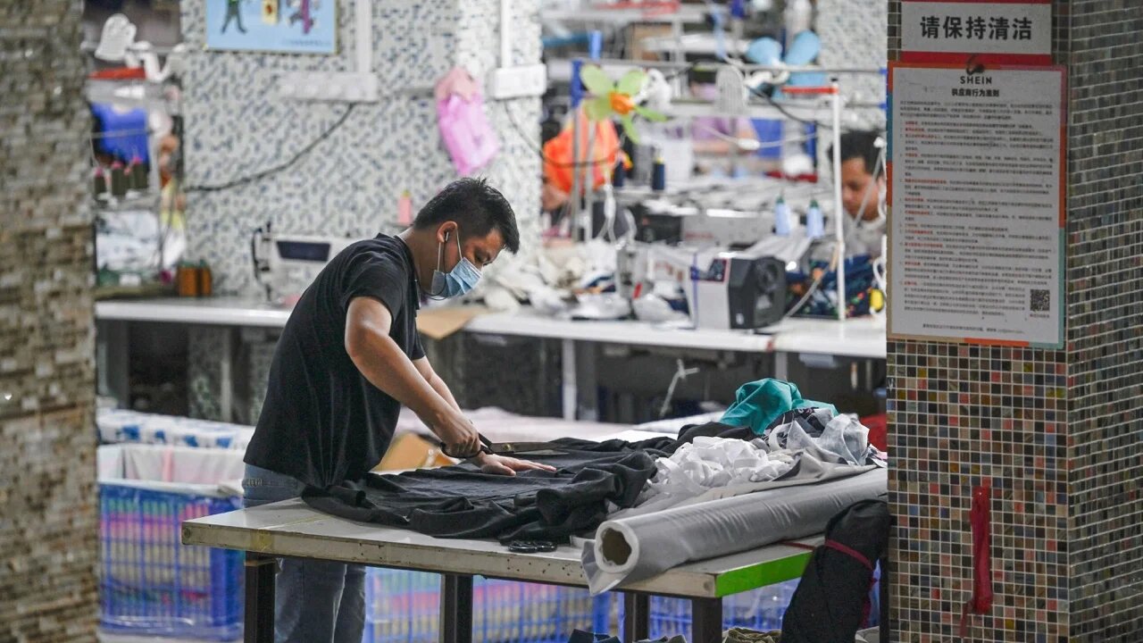 Workers produce garments at a textile factory that supplies clothes to Shein in Guangzhou in southern China's Guangdong province on 11 June 2024 (AFP/Jade GAO)