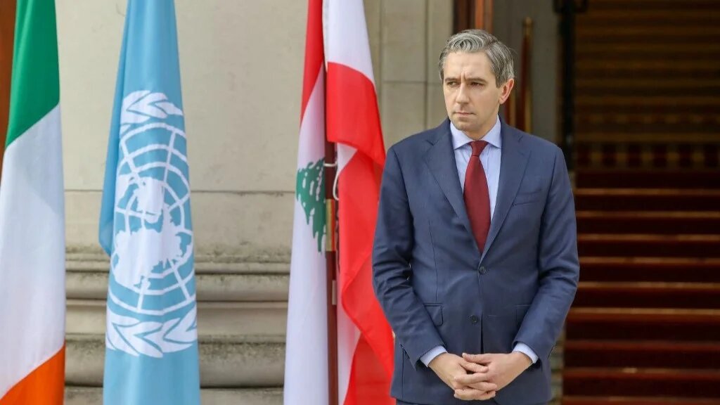 Ireland's Prime Minister Simon Harris awaits the arrival of Lebanon's Prime Minister Najib Mikati at Government Buildings, Tithe an Rialtais, in Dublin, on October 25 (AFP)