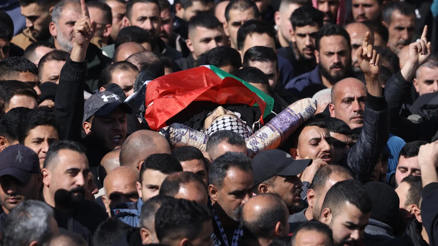 Mourners carry the body of 40-year-old Palestinian man Jaafar Dababshe during his funeral in the village of Taluza, north of Nablus in the occupied West Bank on 7 January 2025 (AFP/ Jaafar Ashtiyeh)