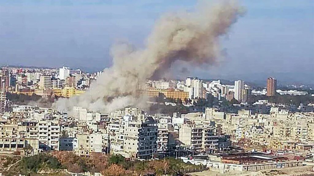 Smoke billows over Latakia after an explosion on 15 March 2025 in this handout picture released by the Syrian Arab News Agency (AFP)