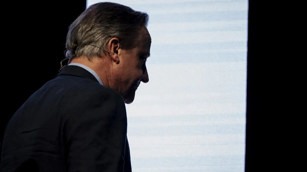 Britain's former Prime Minister David Cameron leaves after a keynote discussion at the two-day Copenhagen Democracy Summit at the Royal Danish Playhouse in Copenhagen on May 13, 2025.