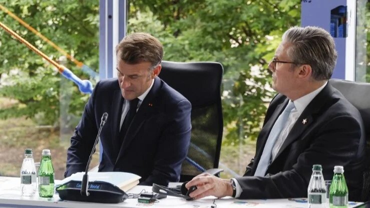  France's President Emmanuel Macron and Britain's Prime Minister Keir Starmer attend a meeting the European Political Community (EPC) summit, in Tirana on May 16
