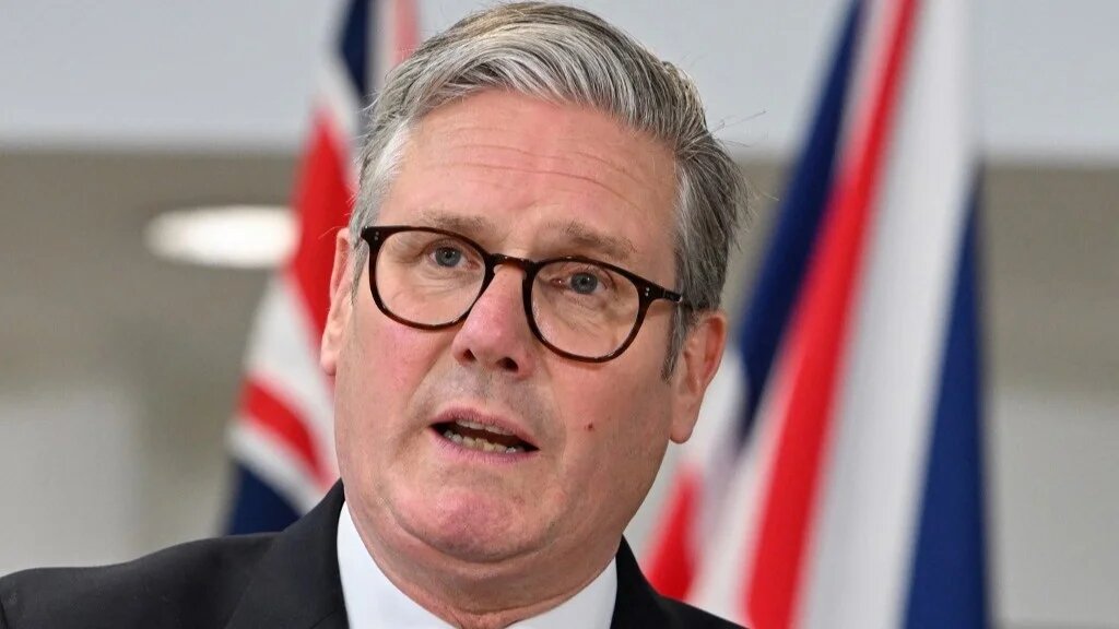 Prime Minister Keir Starmer speaks during a press conference at a military headquarters in north-west London on 22 May (AFP)