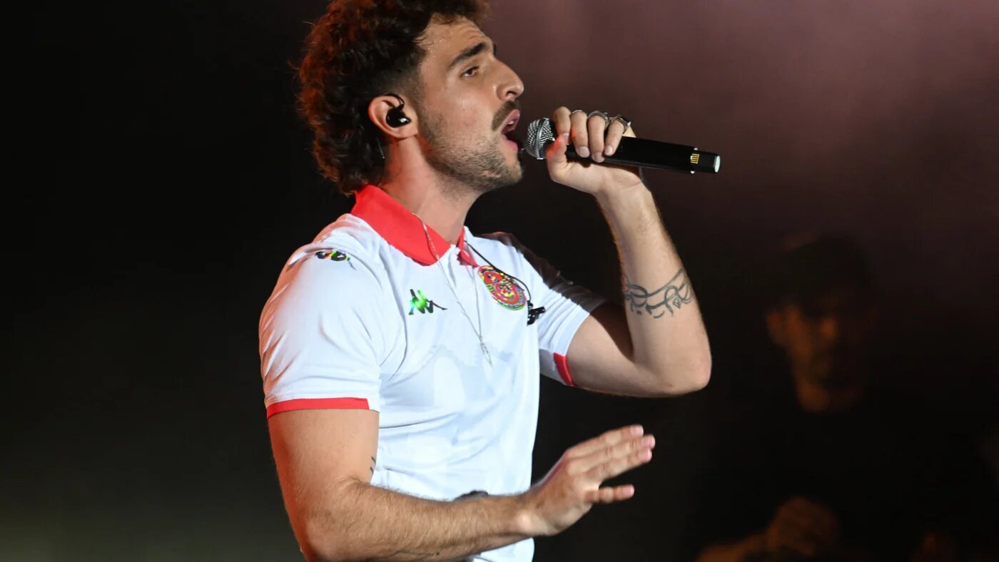 Palestinian-Algerian artist Saint Levant performs at the 59th Carthage International Festival at the Roman Theatre of Carthage, near Tunis, on 5 August 2025 (Fethi Belaid/AFP)