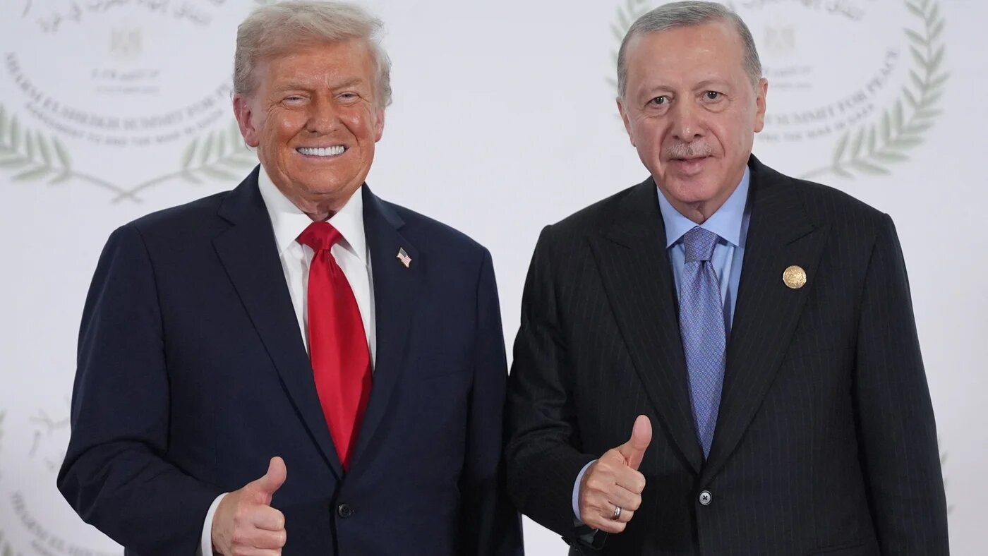 US President Donald Trump and Turkish President Recep Tayyip Erdogan pose for a photo during the Gaza ceasefire summit in Sharm el-Sheikh, Egypt on 13 October 2025 (Evan Vucci/AFP)