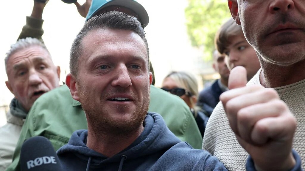 British far-right activist Tommy Robinson, whose real name is Stephen Yaxley-Lennon, arrives at Westminster Magistrates' Court in London on 4 November 2025