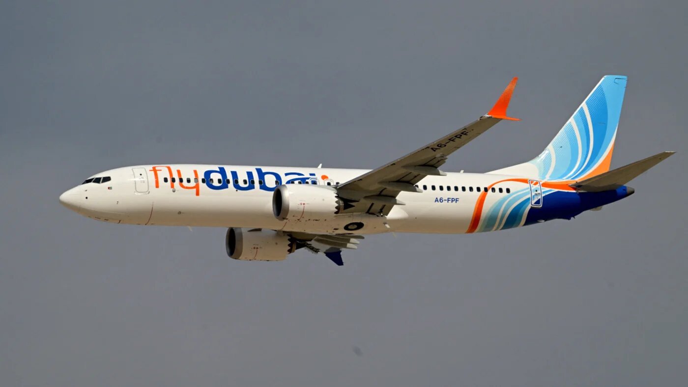 A Flydubai Boeing 737 MAX 8 performs a display flight at Al-Maktoum International Airport during the Dubai Airshow 2025 in Dubai on 17 November 2025 (Giuseppe Cacace/AFP)