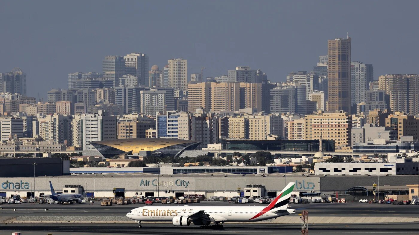 Aviation networks, infrastructure and laissez-faire policies have helped the Gulf city become the business hub of the Middle East and Africa. Dubai International Airport, 1 February, 2021. (Karim Sahib/AFP)
