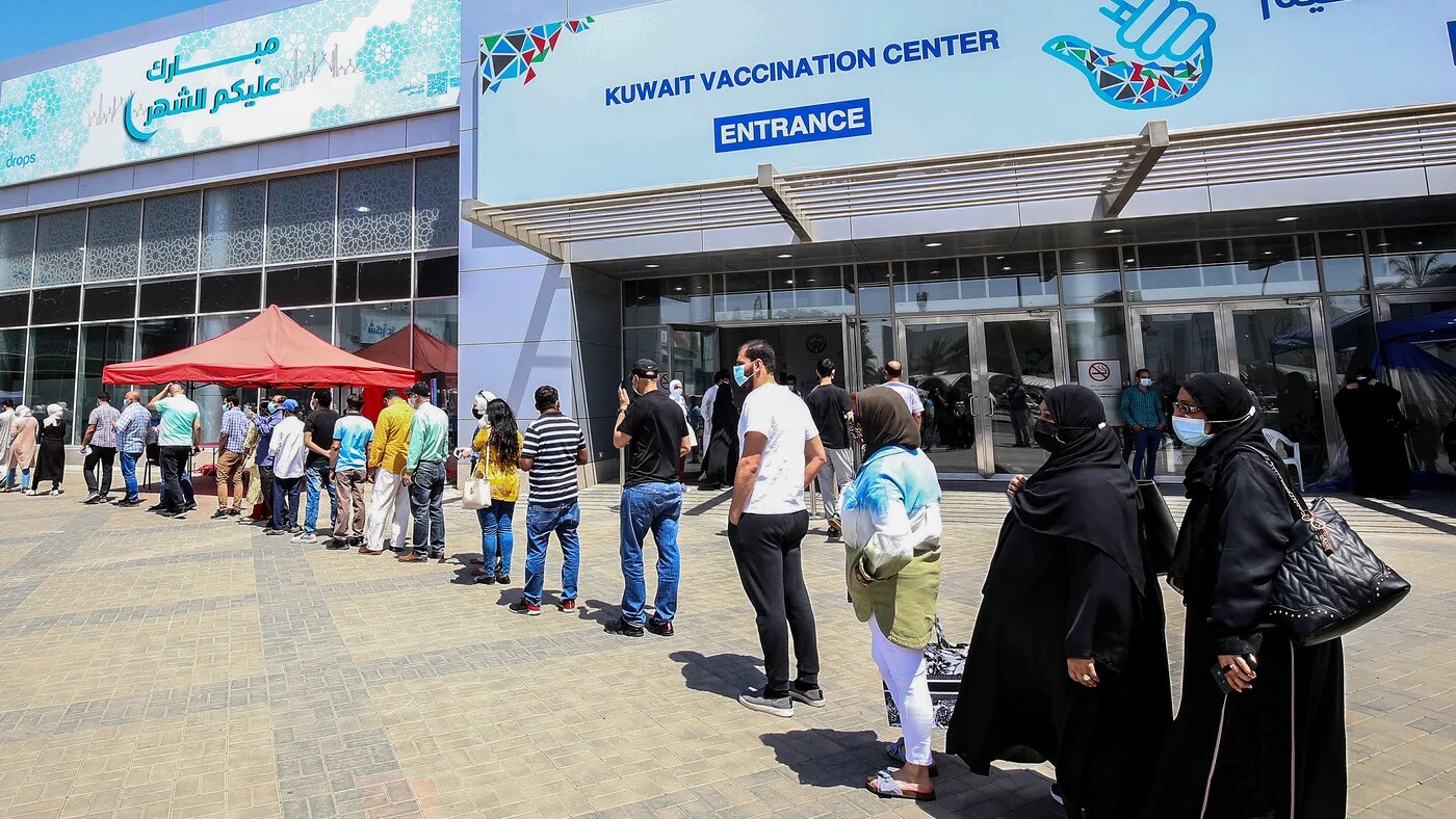 A queue in Kuwait for the Covid vaccine