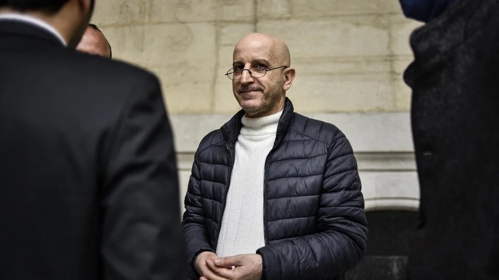 L’islamologue Saïd Djabelkhir devant le tribunal d’Alger, le 22 avril 2021 (AFP)