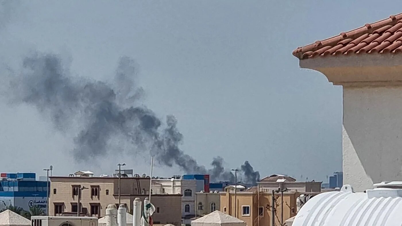 A smoke plume rises over Abu Dhabi following an Iranian missile strike on 28 February 2026 (AFP)