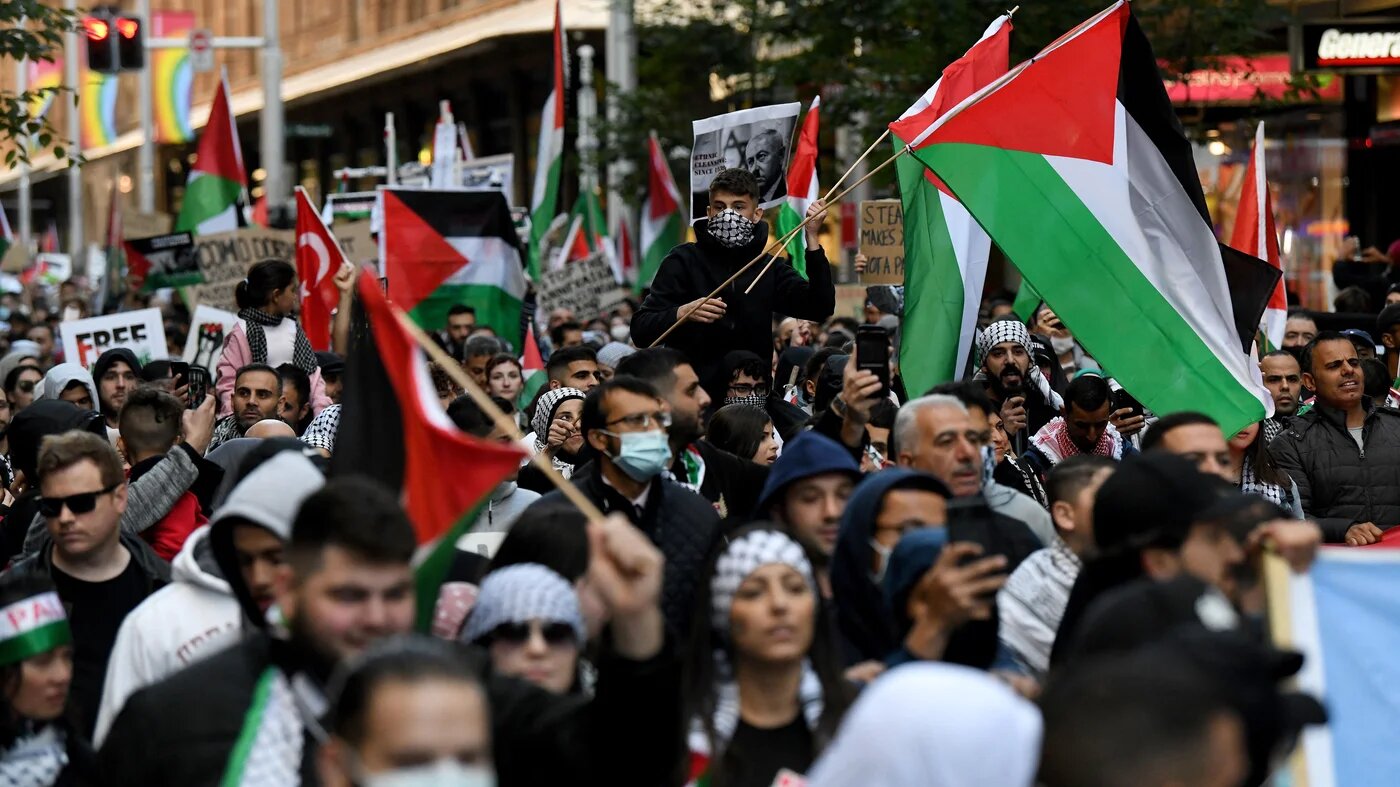 Protesters wave Palestinian flags in Sydney