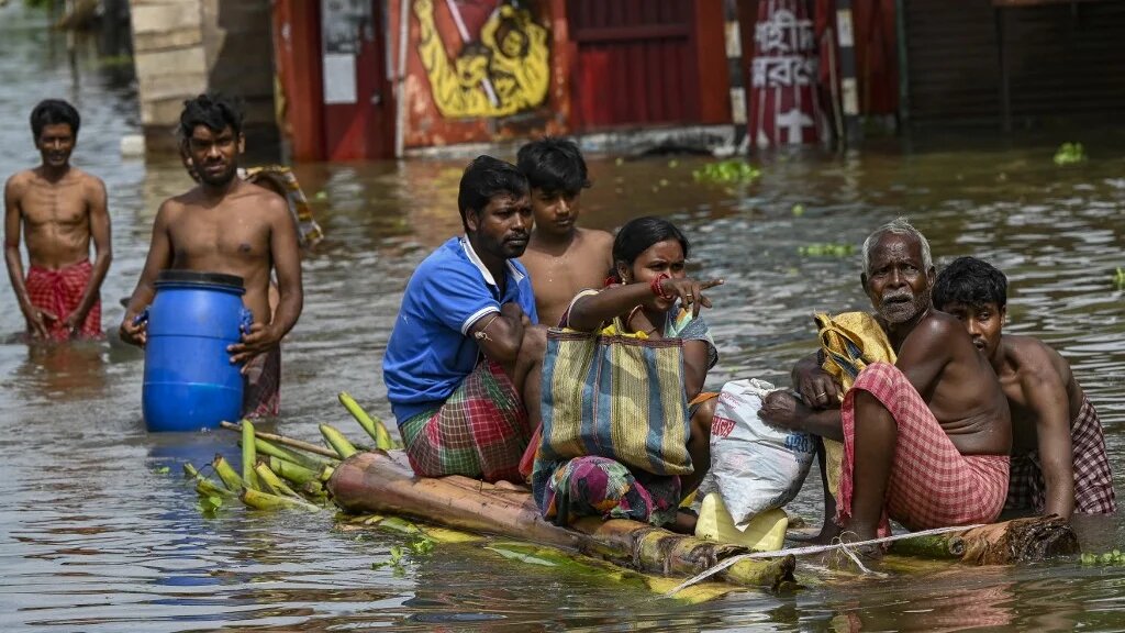 Le financement de l’aide aux pays en voie de développement et les pays moins avancés,  frappés par les dommages causés par le changement climatique, a divisé les participants à la COP26 (AFP/Dibyangshu Sarkar)