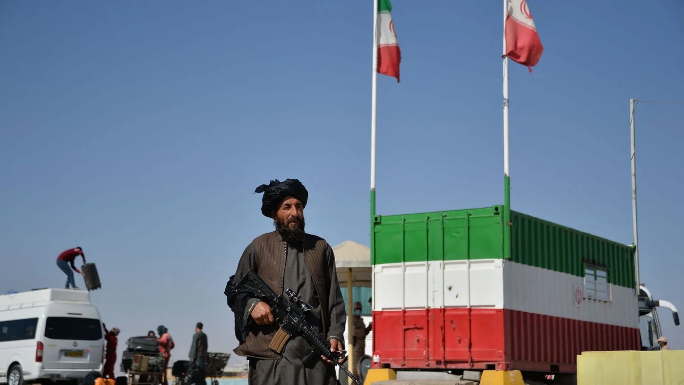 In this picture taken on October 19, 2021 a Taliban fighter stands guard at the Islam Qala border between Iran and Afghanistan (AFP)