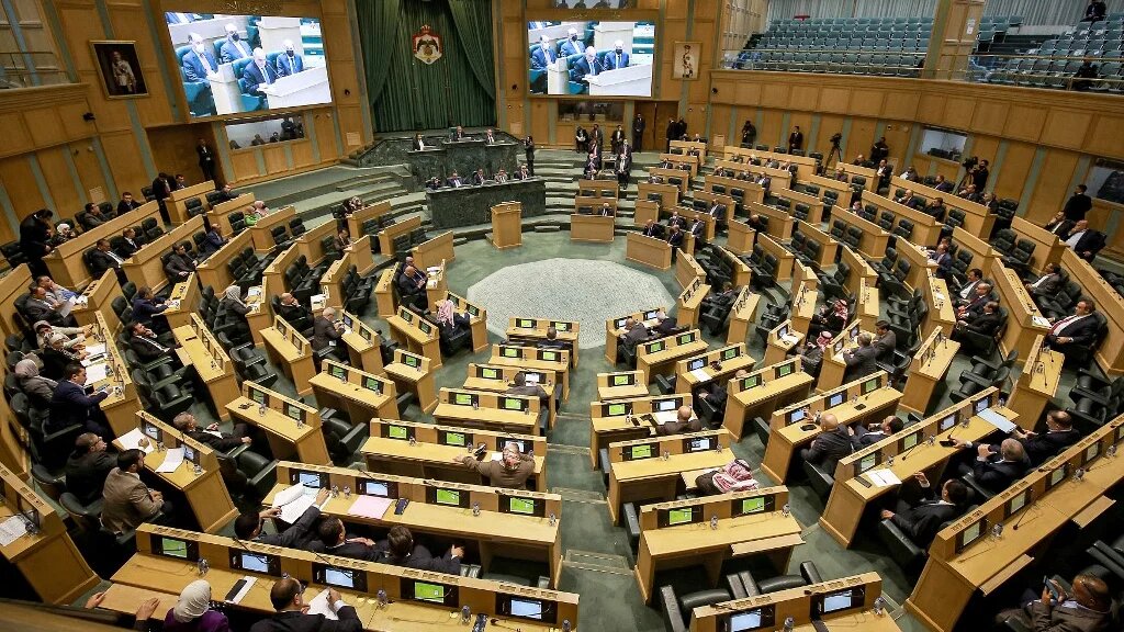 Members of Jordan's parliament attend a session on 15 December 2021 (AFP)