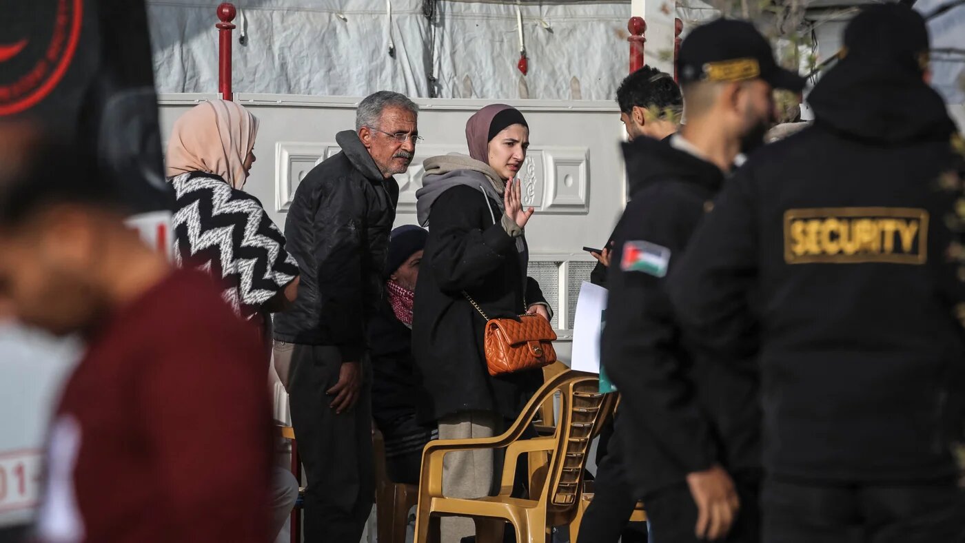 Palestinians wait to leave Gaza for Egypt via the Rafah crossing, in Khan Younis on 19 March 2026