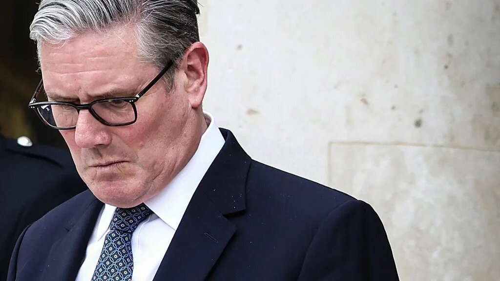Britain's Prime Minister Keir Starmer reacts as he prepares to leave the Elysee Presidential Palace in Paris on April 17, 2026. (AFP)