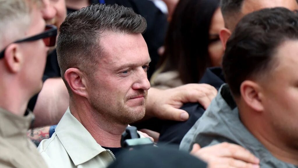 British far-right activist Tommy Robinson, real name Stephen Yaxley-Lennon, looks on during a rally organised by Unite The Kingdom, in central London on May 16, 2026.