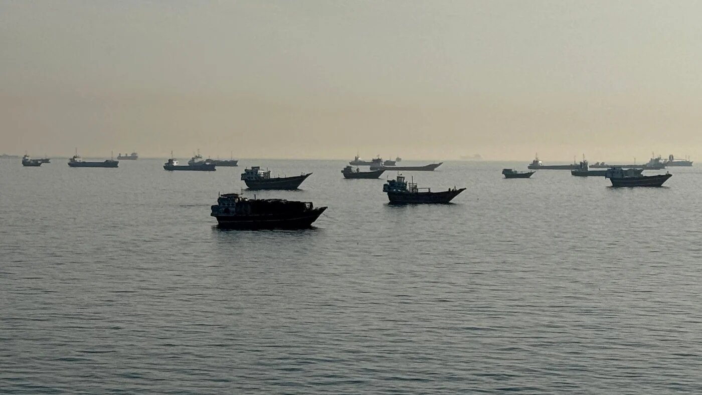 Vessels anchored in the Strait of Hormuz off the port city of Khasab, Oman, 17 May 2026 (AFP)