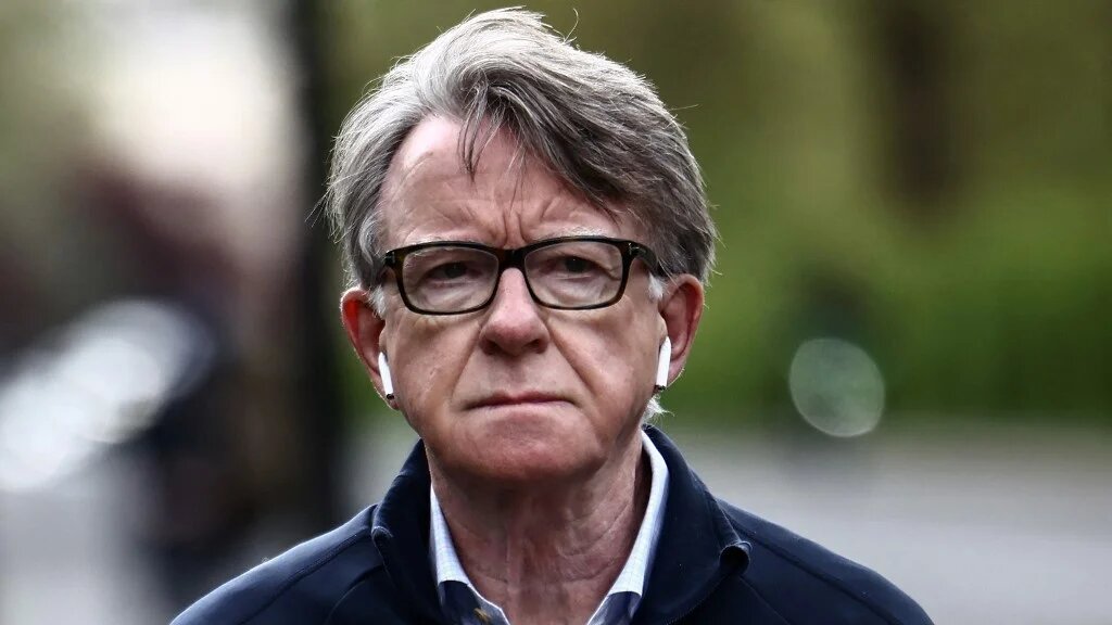 Former UK ambassador to the United States Peter Mandelson walks his dog near his residence in central London on 20 April 2026 (Henry Nicholls/AFP)