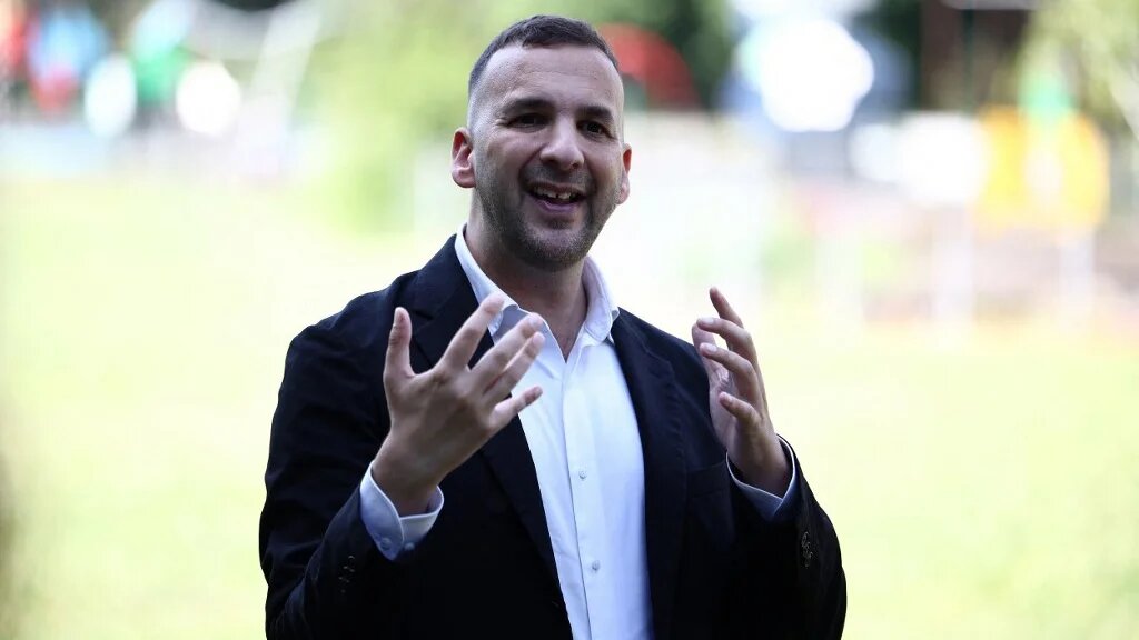 Britain's leader of the Green Party, Zack Polanski, addresses supporters during a rally in south London, on 24 June 2026