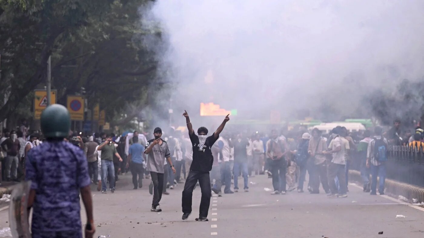 Rapid Action Force (RAF) personnel fire tear gas shells to disperse supporters of the Cockroach Janta Party (Arun Sankar / AFP)