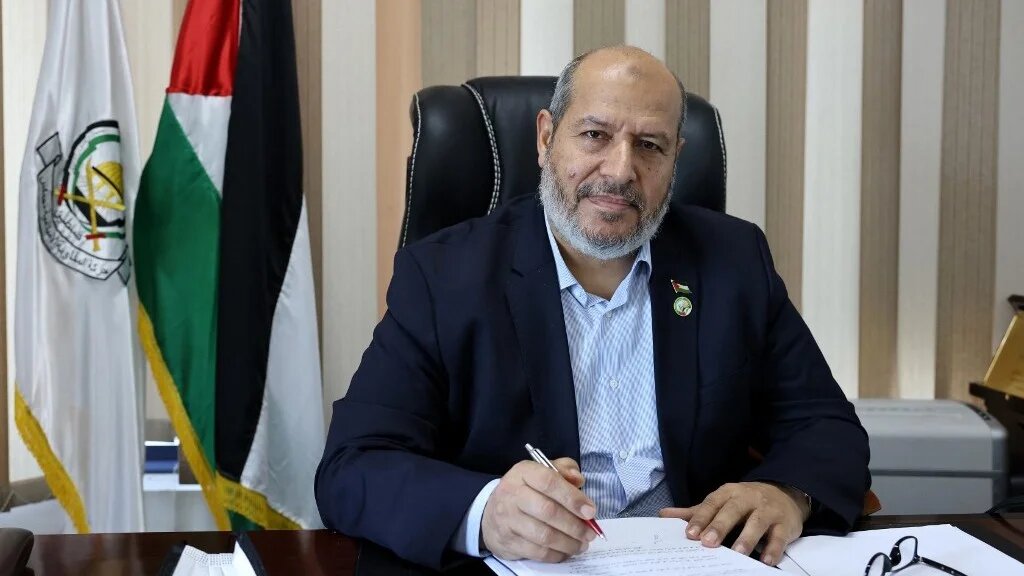 Khalil Al Hayya, senior leader and top Hamas legislative candidate, smiles during an interview with AFP at his office in Gaza City on April 21, 2021. (Emmanuel Dunand/AFP)