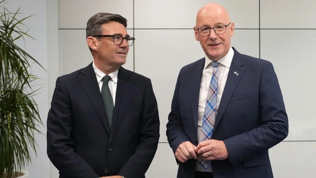 Britain's Prime Minister Andy Burnham meets Scottish National Party (SNP) First Minister John Swinney in Glasgow, 23 July 2026 (AFP)