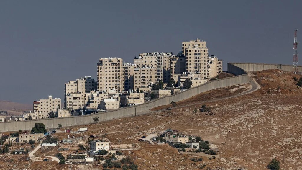 Israel's controversial wall separating East Jerusalem from the Palestinian village of Abu Dis in the Israeli-occupied West Bank.