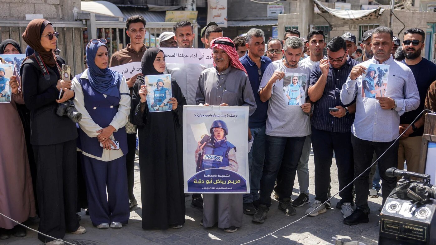 People attend a vigil organised by Palestinian journalists to commemorate their killed colleagues at the Nasser Medical Complex in Khan Yunis, in the southern Gaza Strip, on 25 August 2026 (Bashar Taleb/AFP)