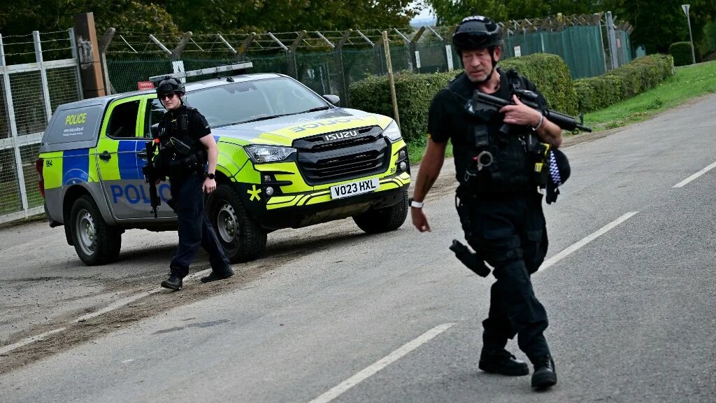Armed Police stand outside RAF Fairford base in Fairford, south-west England on September 28, 2026