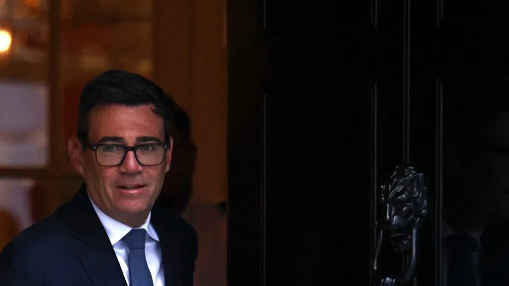 Britain's Prime Minister Andy Burnham leaves 10 Downing Street in central London to take part in the weekly session of 'Prime Minister's Questions' (PMQs) at the parliament on 14 October 2026 (AFP)