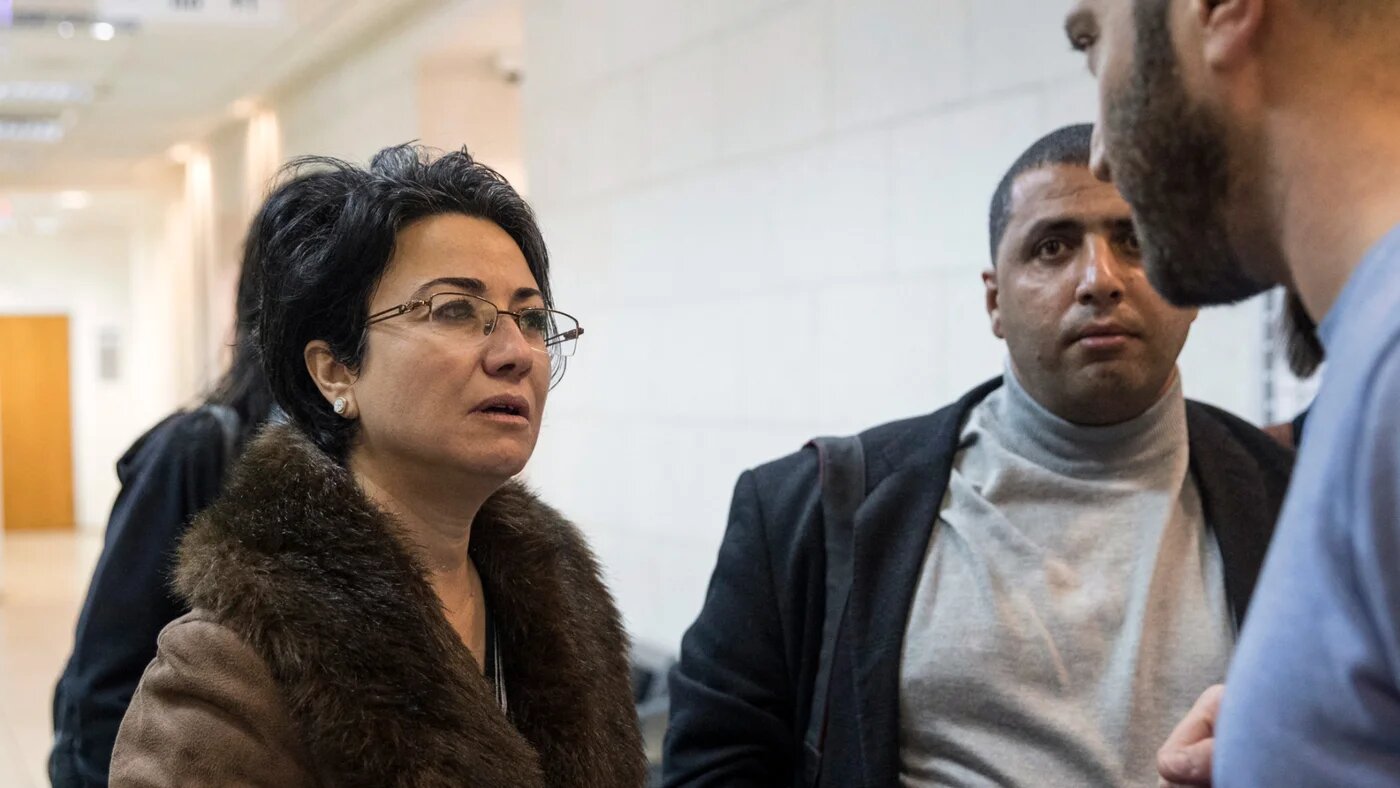 Haneen Zoabi (left) arrives to support fellow parliament member Basel Ghattas at the Rishon Lezion court near Tel Aviv, 23 December 2016 (AFP/Jack Guez)