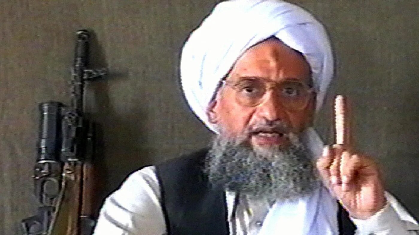 A TV grab taken 17 June 2005 from Qatar-based Al-Jazeera news channel shows Ayman al-Zawahiri delivering a speech with a machine gun next to him (AFP)