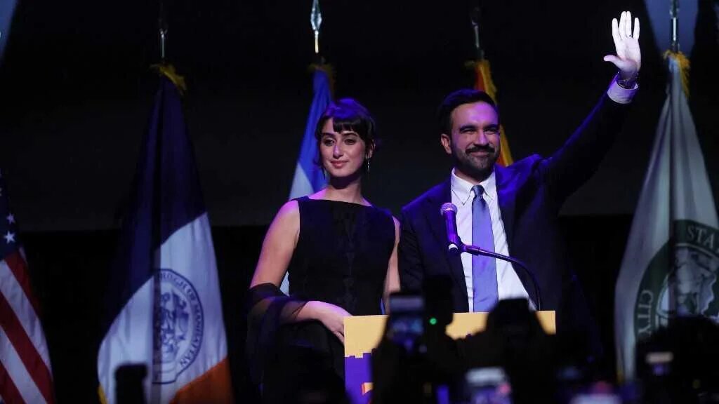 Zohran Mamdani celebrates as he takes the stage at his election night watch party at the Brooklyn Paramount on November 4, 2025 in the Brooklyn borough of New York City. 