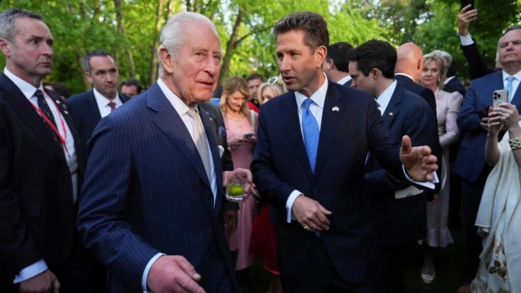 Britain's King Charles III and British Ambassador to the U.S. Christian Turner (R) attend a garden party at the British Embassy on day one of King Charles III and Queen Camilla's State Visit to the United States of America on April 27, 2026 in Washington, D.C. 